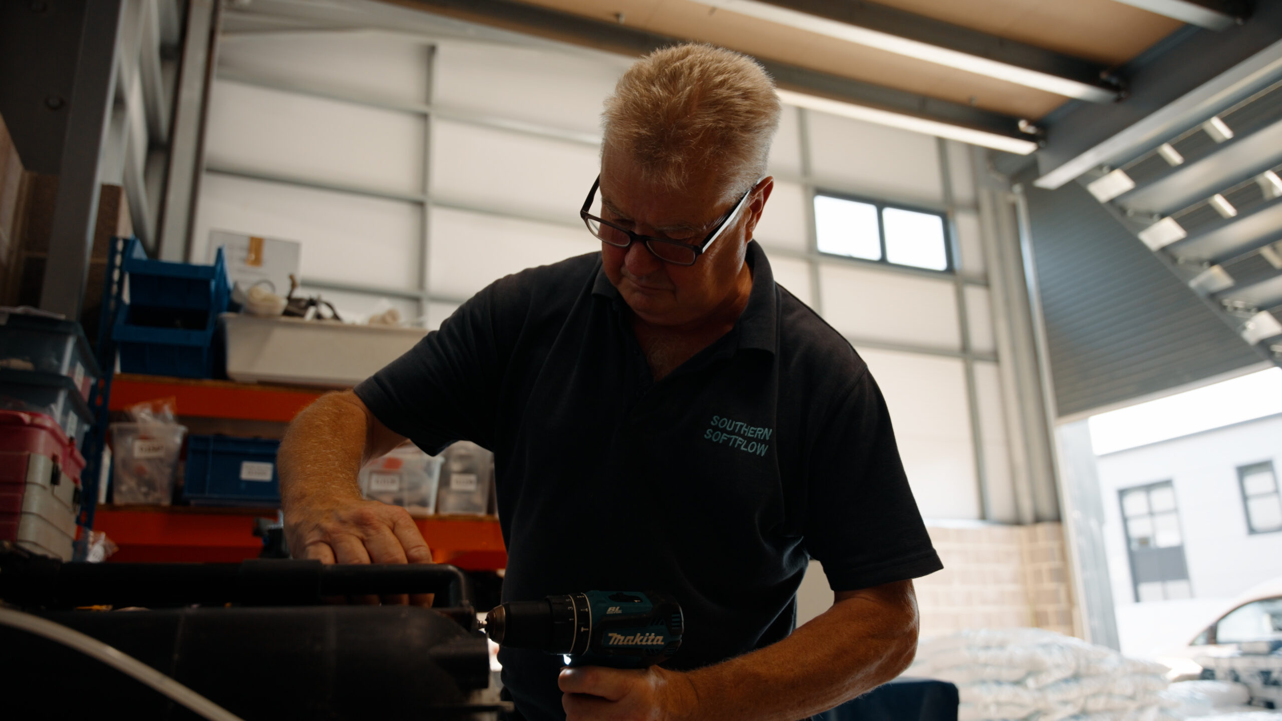 Water softener servicing by a Southern Softflow engineer